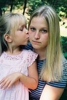 Carrie kissing Paige