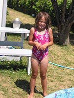 Isabelle being splashed by Carrie.
