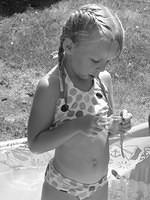Carrie looking at her sunglasses