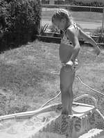 Carrie standing on the slide