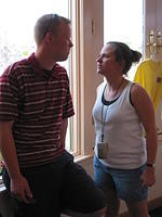 Ric and Krissy glaring at one another.