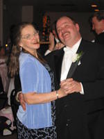 Mom and Uncle Eric dancing, and yes, that's also a cigar.