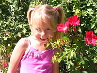 Carrie and the flowers again, this time in color, so you can see they are in fact, really flowers.