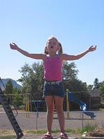 Carrie standing ontop of these wooden blocks yelling "I'M QUEEN OF THE WORLD".  She obviously watches WAY too much tv.