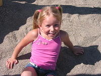 Carrie fell off of these slider things at the playground.  :P