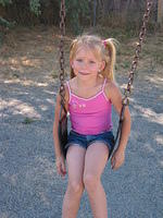 Carrie on the swing.