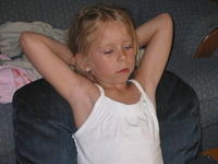 Carrie relaxing and watching TV.