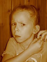 Carrie, trying to change her earrings.