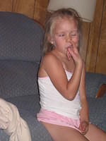 Carrie pretending to pick her nose.