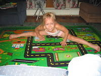 Carrie showing off how well she can do the splits.