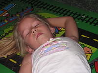 Carrie pretending to be dead.