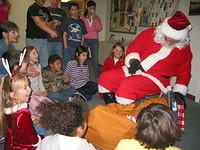 Santa gets out his first present