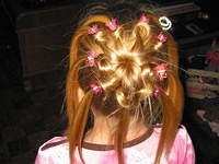 Carrie's new hairstyle that Mom made.