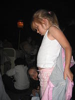 Carrie getting her coat on.