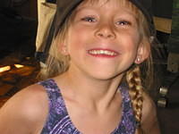 Carrie wearing Uncle Shawn's hat.