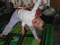 Carrie, with Tamara hiding behind her, both being rather silly.