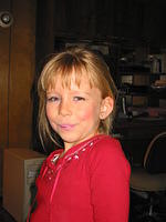 Far too much make-up.  It's almost scary. ;)