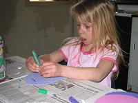 Carrie decorating Easter Eggs for the front door.