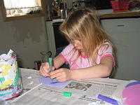 Carrie decorating Easter Eggs for the front door.