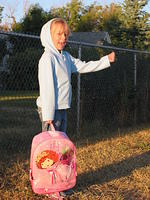 Carrie, trying to get me to take a picture of someone else at the bus stop. :P