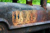 What's left of the IHC logo on the tractor
