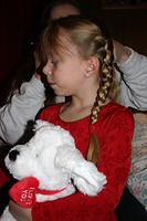 Carrie dressed up for Valentine's Day, getting her hair done, and holding a new animal.