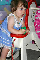 Joleigh checking out her new (old, was Michelle's) rocking horse.