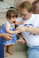Joleigh drinking Daddy's root beer.