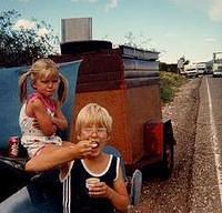 Paige pouting, and Shawn eating pudding
1986